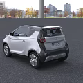 White Compact Electric Car With Modern Design And LED Headlights In Outdoor Building Setting