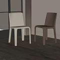 Modern White and Brown Dining Chairs in Room With Wooden Floor and Window Curtains