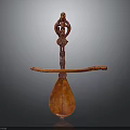 Red Wooden Carved Household Utensil With Decorative Human Figure Design