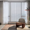 Modern Accent Chair in Brown with Floor Lamp Green Plants and Geometric Rug by Window