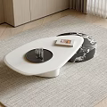 White Modern Coffee Table With Black Tray And Marble Pattern Ottoman In Living Room