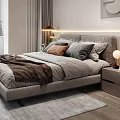 Modern Bedroom Interior With Gray Bedding Multiple Pillows Brown Blanket Nightstand Table Lamp And Rug