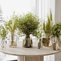 Elegant Flower Arrangements With Various Vases And Green Plants On Marble Tabletop Indoor