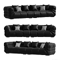 Black Sectional Sofa with Multiple Black Cushions and White Accent Pillows in Modern Leather Design