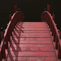 Red Wooden Bridge With Arched Design And Railings On Black Background
