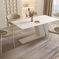 Modern Dining Table Set With White Tabletop Four Beige Chairs Metal Legs Minimalist Indoor Setting