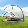 Outdoor Sofa With Light Colored Cushions In Transparent Dome Wooden Frame On Green Grassland