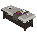 Comfortable Massage Bed With Brown Frame Soft Cushion Face Hole Towels And Flowers