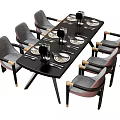 Modern Gray Dining Chairs With Black Dining Table Set With Plates Wine Glasses And Cutlery