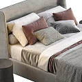 Cozy Upholstered Gray Double Bed With Brown Gray Beige Pillows And Textured Blanket