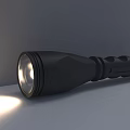 Black Flashlight With Textured Grip And Bright Illuminating Light Beam 3d model