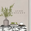 White Vase With Green Leaves On Marble Table With Books Limes And Decorative Ball