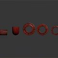 Red Circular Flanges Equipment With Various Sizes Arranged On Dark Background