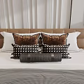 Stylish Bed Pillows With Brown Patterned Black and White Checkered And Gray Cylindrical Designs