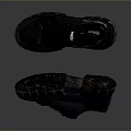 Pair Of Black Leather Casual Shoes With Textured Sole For Daily Wear