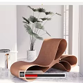 Modern Curved Lounge Chair Interior With Green Plant And Side Table Books