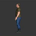 A Man Wearing Green T shirt Blue Jeans And Green Boots Standing Against Gray Background