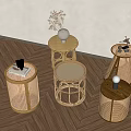 Various Rattan Side Tables With Decorative Vase And Books On Wooden Floor
