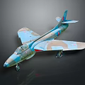 Military Airplane Model with Blue Green Brown Camouflage Cockpit Landing Gear Down and Dark Background
