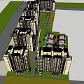 Lush Landscaped Garden in Modern Residential Complex With Central Pathway and Greenery Flowers