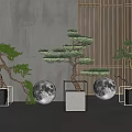Three Bonsai Trees On Stone Pedestals With Moon Decor And Wooden Lattice Against Gray Wall