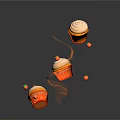 Floating Decorated Cupcakes With Orange Cream Topping And Small Fruit On Dark Background With Reflections