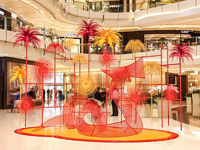 Vibrant Mall Photo Spot With Colorful Art Installation And Palm Like Structures 3d model