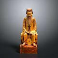 Traditional Man In Ancient Robes With Long Beard Wooden Sculpture Sitting On Red Pedestal Base
