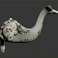 Mermaid Statue With White Body Brown Spots And Blue White Tail Sitting On Black Surface