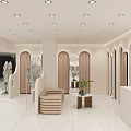 Modern Fashion Retail Counter In Shopping Mall With Mannequins Hanging Clothes And Bright