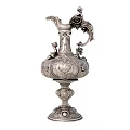 Antique Silver Ewer With Ornate Carved Design Decorative Handle And Base