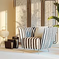 Black and White Striped Single Sofa With Floor Lamp Geometric Screen And Large Green Plant