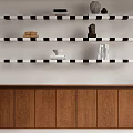 Brown Wooden TV Cabinet With Black And White Striped Shelves And Decorative Items On Top