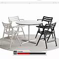 Round White Dining Table With Two White And Two Black Chairs On Light Round Rug 3d model