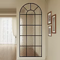 Arched Top Black Frame Textured Glass Screen in Interior with Framed Artworks and Window Curtains
