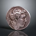 Artistic Ancient Silver Coin Sculpture With Detailed Human Head Carving Design