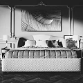 Elegant Double Bed with Quilted Upholstery Decorative Painting Bedside Lamps and Ornate Wall Panels