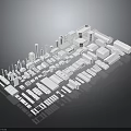 White Architectural Building Models Showcasing Various Designs In Arranged Display On Dark Reflective Background
