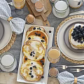 Elegant Tableware Collection With Tulips Jam Jar Juice Glasses Fresh Fruits Desserts And Linen Napkins