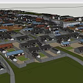 Aerial View Of Dense Residential Housing Area With Roads And Green Spaces