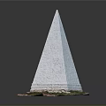 White Pyramid Architectural Structure with Green Grass at the Base and Stone Design