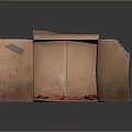 Open Corrugated Cardboard Box With Red Cloth Inside And Green Cloth Beside