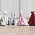 Elegant Strapless Evening Dresses In Various Colors With Ruffled Details On Mannequins