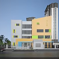 Colorful Kindergarten School Building With Orange White Green Exterior Glass Windows And Trees Near Street