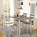 Elegant Modern Dining Room With White Table Chairs Pink Flowers And Natural Light