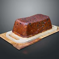 Moist Fruit Cake With Glazed Surface On Wooden Tray And Dried Fruits Decoration