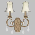 Elegant Golden Wall Sconces with Cream Lampshades and Crystal Pendants on Light Blue Wallpaper