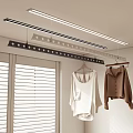 Indoor Clothes Hanging Space With Window Blinds White Top and Brown Shirt