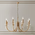 Elegant Gold Chandelier With Candle Style Bulbs And Crystal Pendants On Paneled Wall