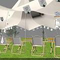 Garden Landscape Featuring White Tensile Membrane Green Lawn Outdoor Seating And Flag Decorations